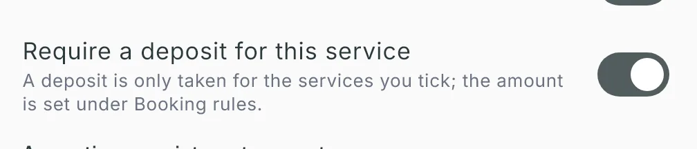 In the service editor, Require a deposit for this service turned on, with its explanation