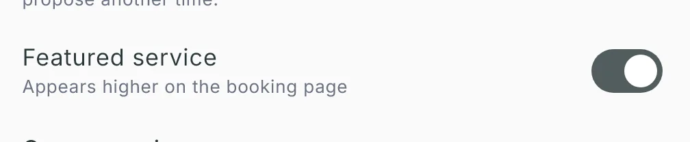 The Featured service toggle switched on in the service editor (“Appears higher on the booking page”)